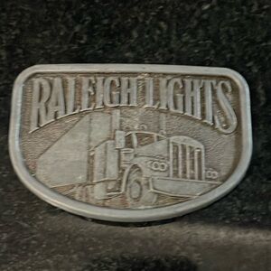 Vintage 1970s Raleigh Lights Trucker Belt Buckle 3 3/8” X 2 1/4” Collectible
